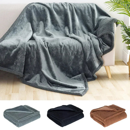Waterproof blanket throw protecting a sofa