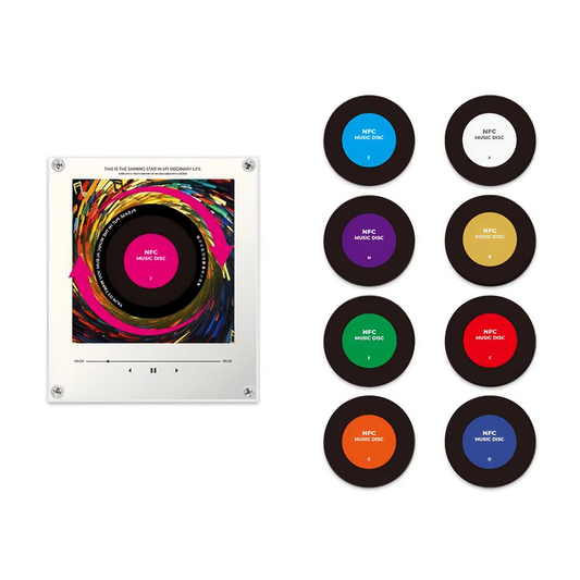 NFC music player magnet disc attached to a fridge door