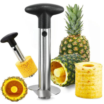 Pineapple cutter corer lifting rings from a whole pineapple