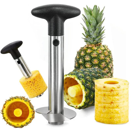 Pineapple cutter corer lifting rings from a whole pineapple