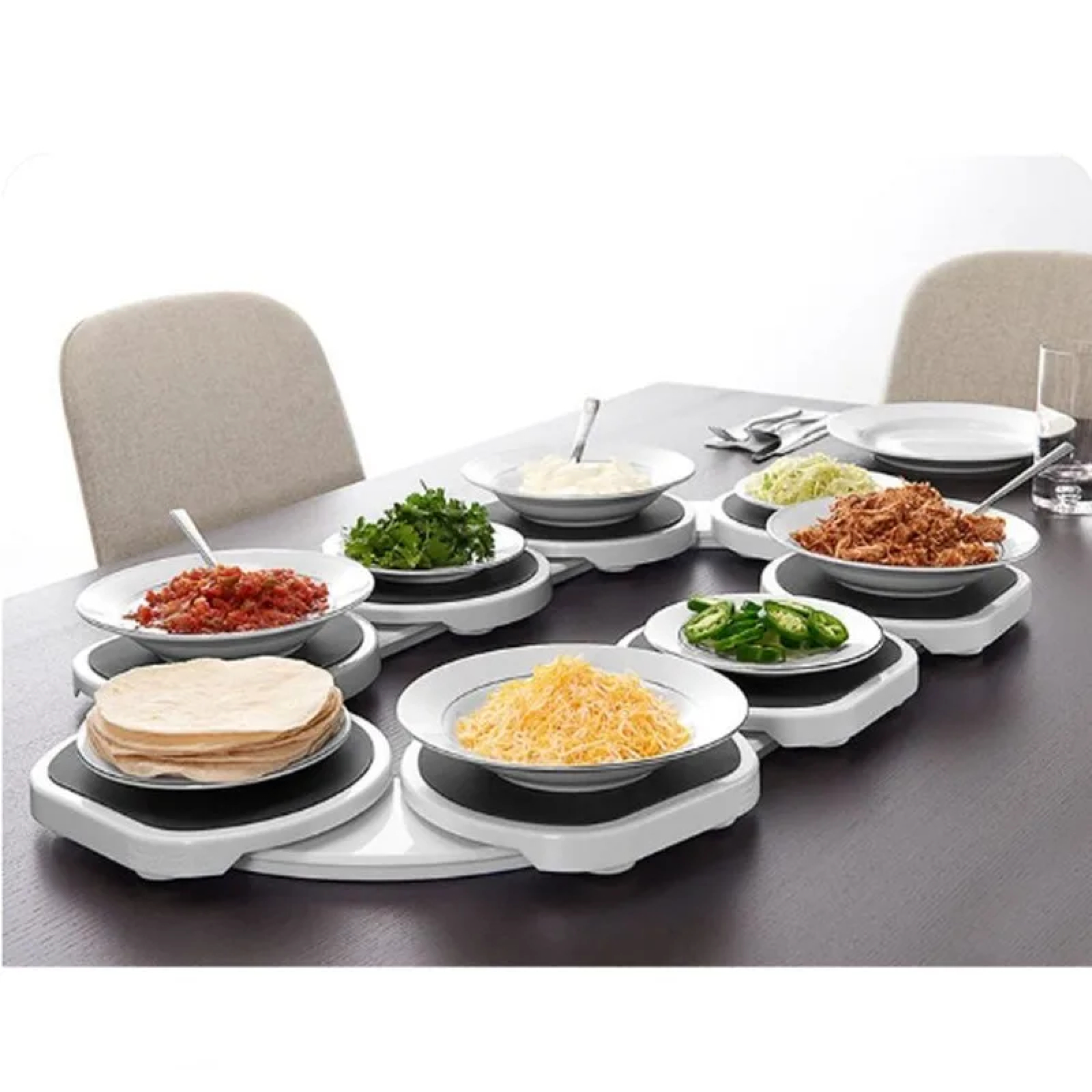 Rotating tray gliding a dish across the table on wheels