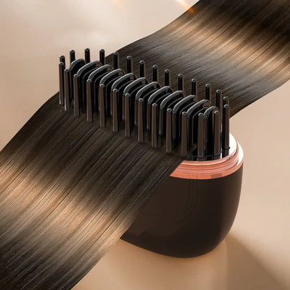 Straightener brush shown in pink